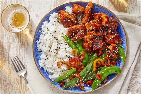 sweet-spicy-chicken-with-jasmine-rice-snow-peas image