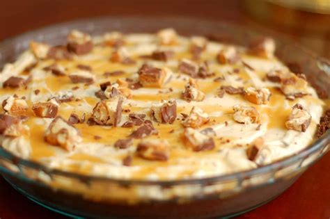 snickers-cheesecake-pie-a-kitchen-addiction image