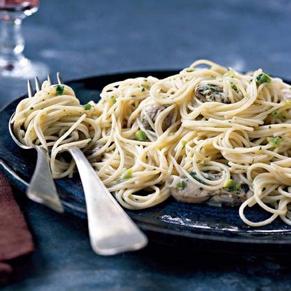 oysters-over-angel-hair-recipe-myrecipes image