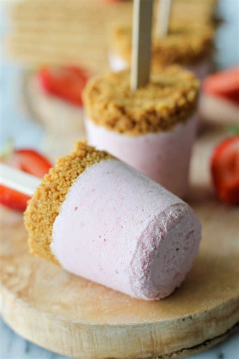 strawberry-cheesecake-popsicles-damn-delicious image