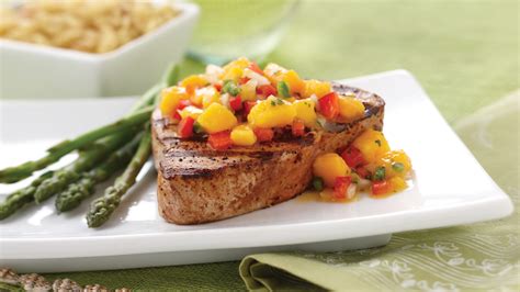 grilled-ahi-tuna-with-fresh-mango-salsa-omaha-steaks image