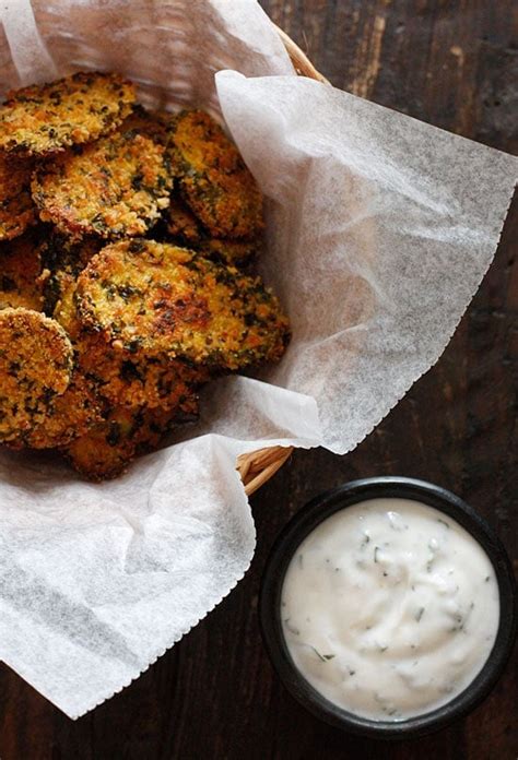 oven-fried-pickles-with-light-herb-ranch-dip image