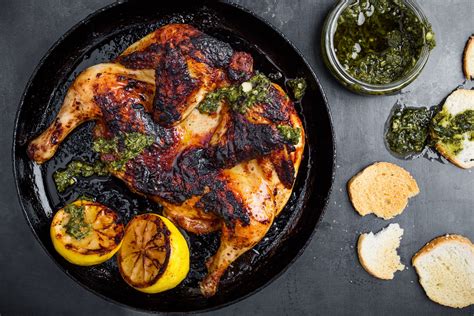 herb-broiled-spatchcock-chicken-recipe-the-spruce image