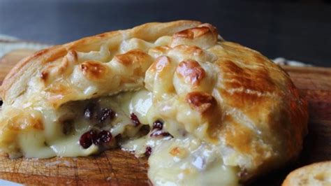 baked-stuffed-brie-with-cranberries-walnuts image