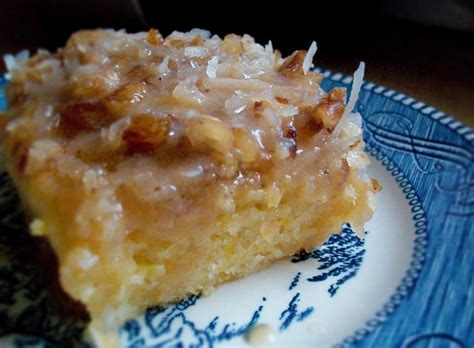 peach-snack-cake-with-coconut-pecan-frosting-tasty image