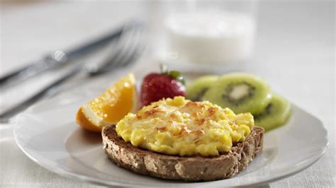 cheesy-broiled-eggs-on-toast-recipe-get-cracking image