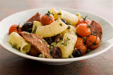 curtis-stone-spicy-salami-rigatoni-with-olives-and-capers image