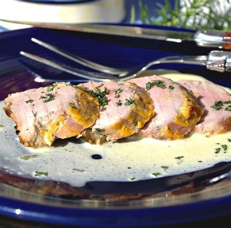 dijon-mustard-pork-tenderloin-with-tarragon-wine-sauce image