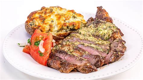 steak-with-dijon-herb-butter-spinach-artichoke-baked-potatoes image