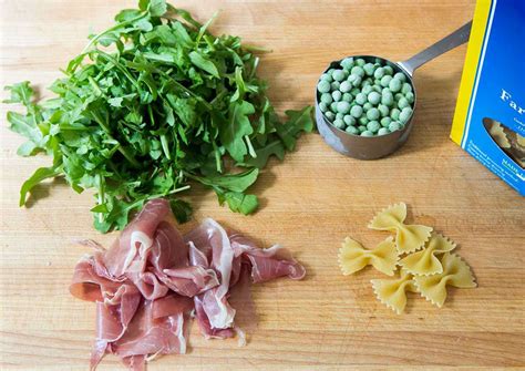 bowtie-pasta-with-peas-prosciutto-and-arugula image