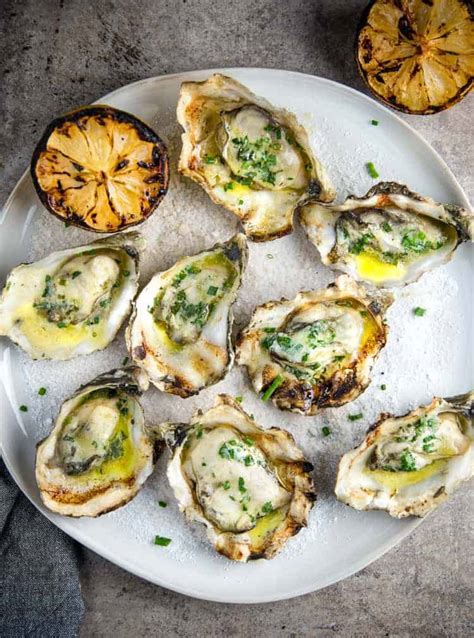 grilled-oysters-with-white-wine-butter-sauce image