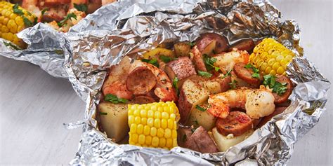 best-grilled-shrimp-foil-packs-recipe-delish image