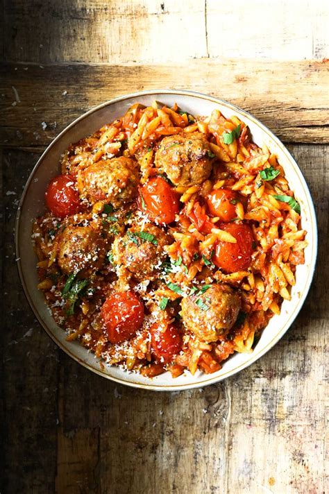 meatballs-in-tomato-sauce-with-orzo-serving-dumplings image