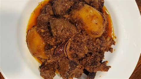 blackened-curried-goat-with-potatoes-recipe-by-tasty image