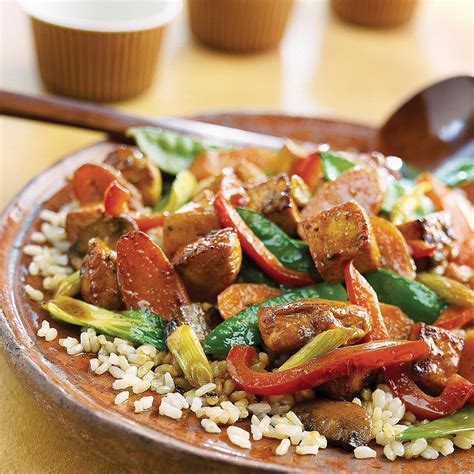 chicken-tofu-stir-fry-recipe-eatingwell image