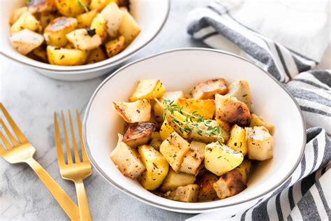 roasted-potatoes-with-basil-thyme-and-garlic image