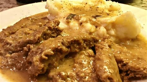 slow-cooker-cube-steak-and-gravy-recipe-simplemost image