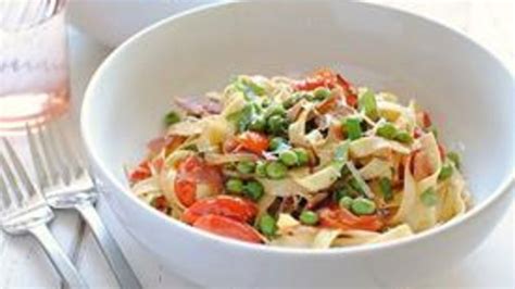 pasta-fresca-with-prosciutto-peas-and-tomatoes image
