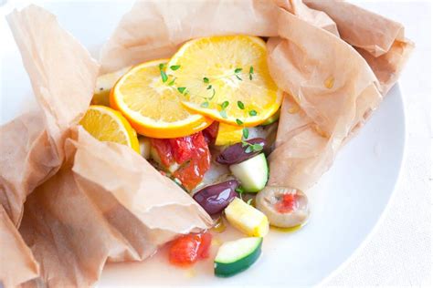 easy-baked-fish-in-parchment-with-orange-and-olives image