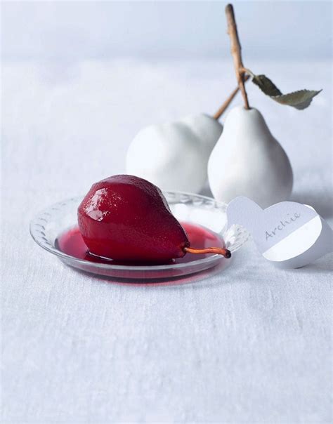 poached-mulled-wine-pears-recipe-delicious-magazine image