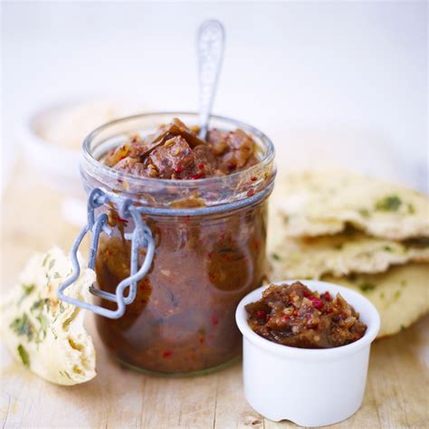 spiced-aubergine-brinjal-pickle-recipe-woman-and image