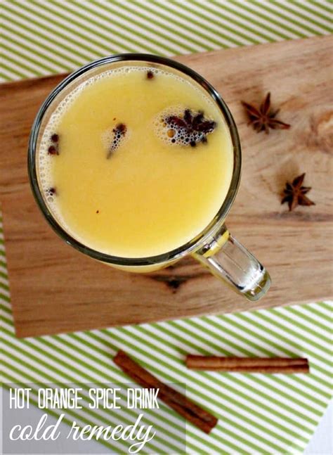 hot-orange-juice-beverage-recipe-with-spices-for-colds image
