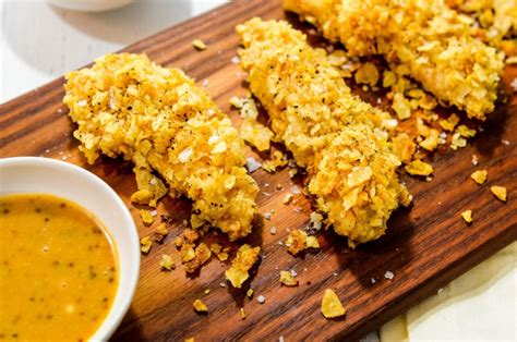 potato-chip-crusted-chicken-fingers-with-honey image