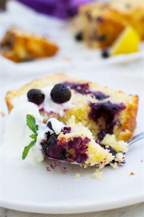 sticky-lemon-curd-cake-with-blueberries-scrummy image