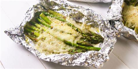 best-cheesy-asparagus-foil-packs-recipe-delish image