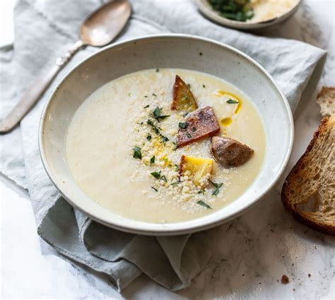 smooth-potato-soup-with-roasted-garlic-familystyle image