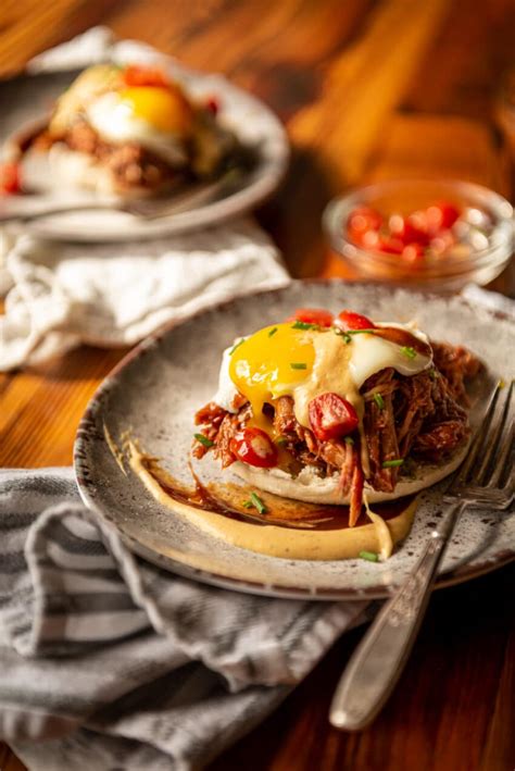 bbq-eggs-benedict-with-pulled-pork-girl-carnivore image