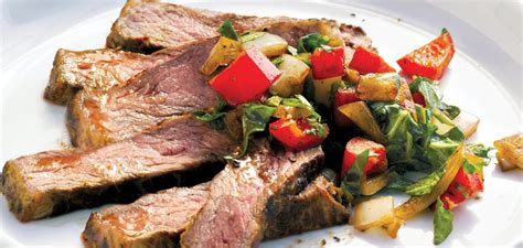 herb-rubbed-steak-with-pepper-arugula-relish image