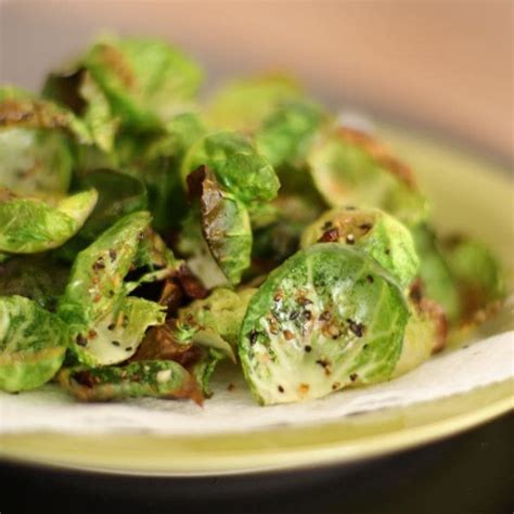 baked-brussels-sprouts-chips-with-lemon-pepper image