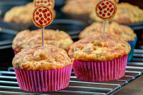 cheesy-vegetarian-pizza-muffins-recipe-by-archanas image