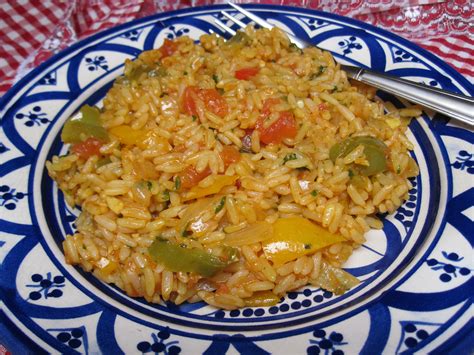 spicy-moroccan-rice-recipe-with-tomatoes-and-peppers image