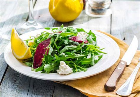 arugula-salad-with-beets-goat-cheese-and-olive-oil image