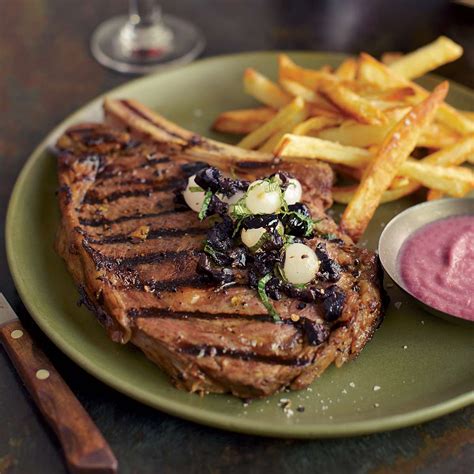 grilled-steaks-with-onion-sauce-and-onion-relish image