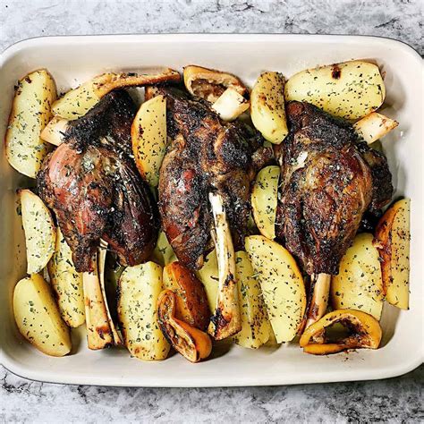 roasted-lamb-shanks-with-lemon-herbed-potatoes image