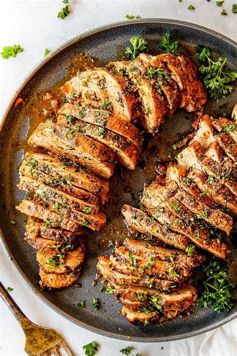 best-baked-pork-tenderloin-with-garlic-herb-butter image