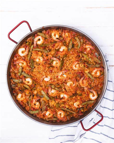 seafood-paella-on-an-open-fire-a-couple image