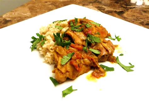 trinidadian-curry-chicken-cooks-with-cocktails image