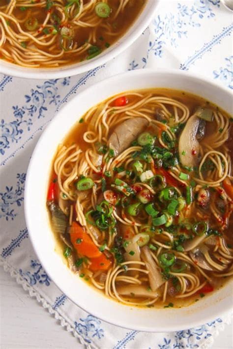 spicy-noodle-soup-with-mushrooms-and-herbs image