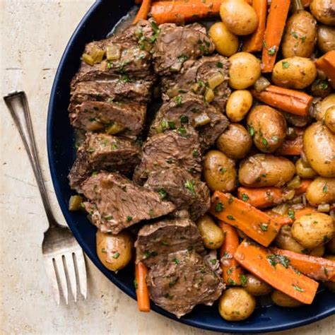 slow-cooker-classic-pot-roast-with-carrots-and-potatoes image