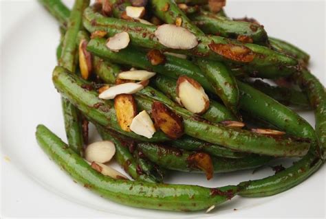 pan-charred-green-beans-with-harissa-and-almonds image
