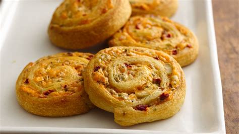 cheesy-olive-bacon-crescent-spirals image
