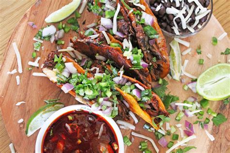 beef-birria-tacos-with-consomme-everyday-creole image