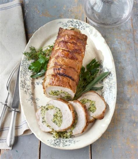 roast-pork-loin-with-herb-stuffing-recipe-country-living image