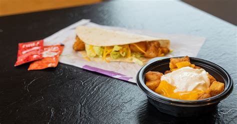 taco-bell-is-bringing-back-the-cheesy-fiesta-potatoes image
