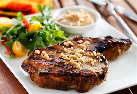 south-asian-pork-chops-with-peanut-satay-sauce image