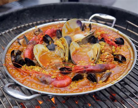 grilled-paella-with-shrimp-mussels-clams image